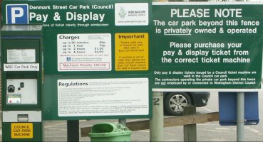 Signs by Council payment machine