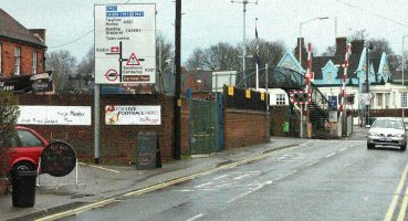 Sign before level crossing
